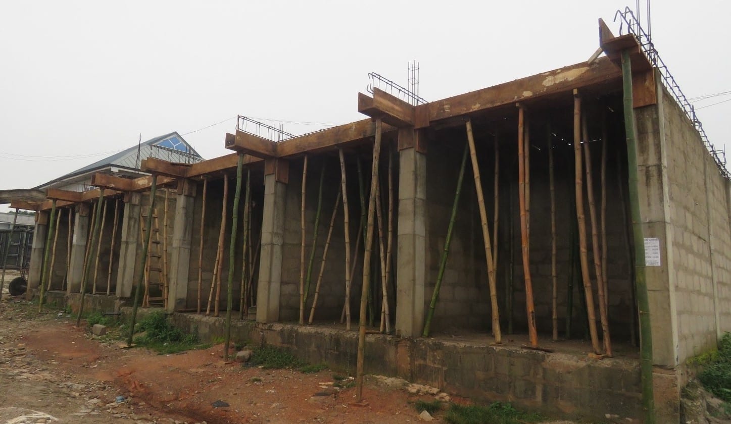 Construction of Stores and Apartments at Atimatim