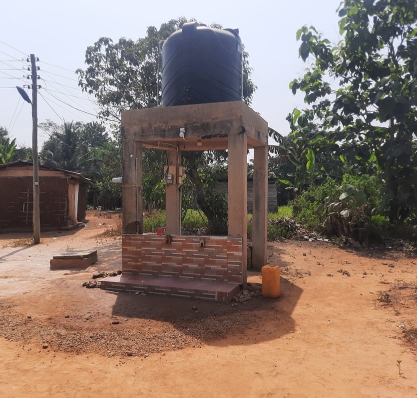 Construction of Mechanized borehole fitted with electric pump and overhead water tank at Adofokrom