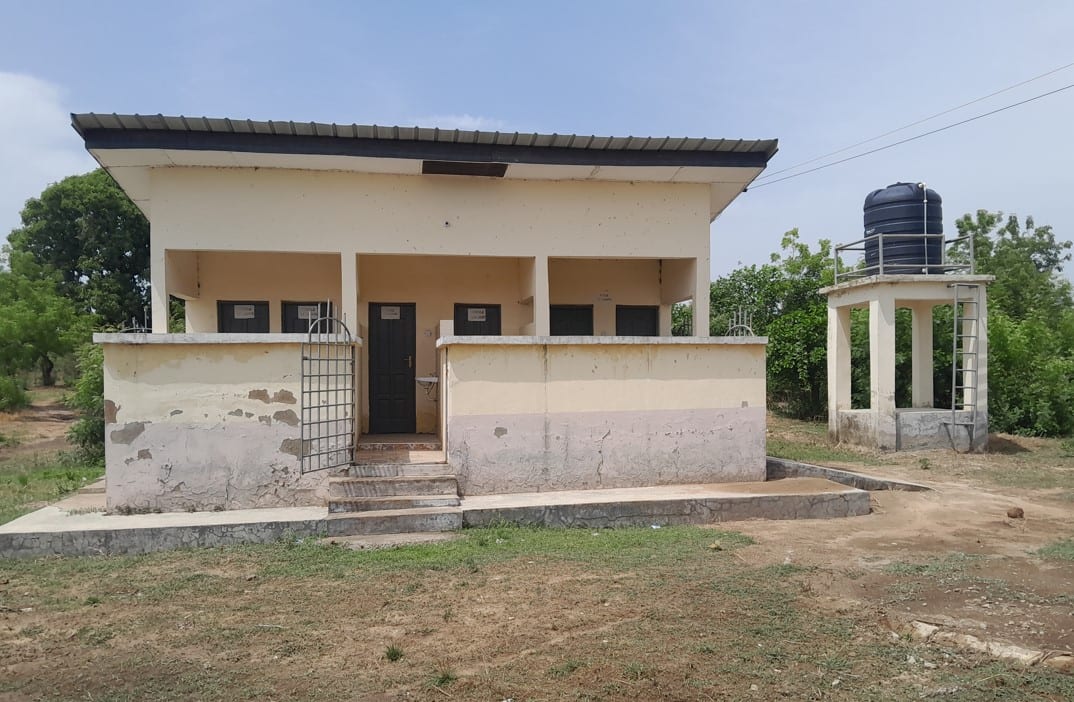 6-Seater Toilet Facility with Overhead Water Tank at Bole SHS