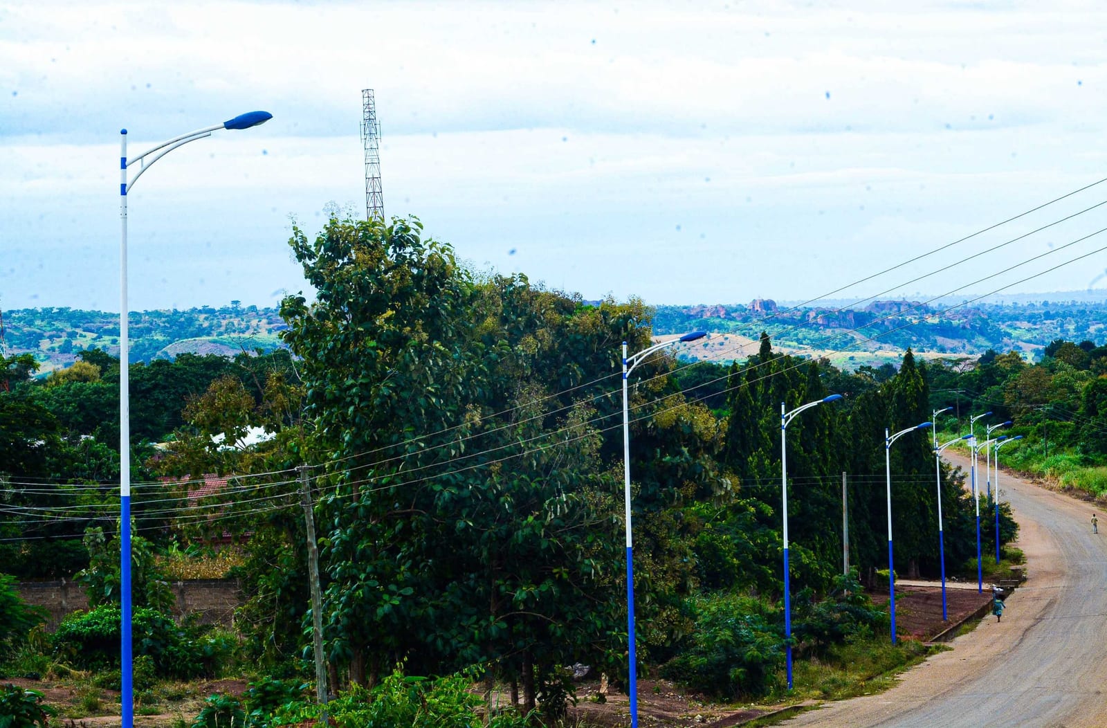 Installation of 184No. Metal Poles Street Light with Fitted Bulbs at Anyinasu