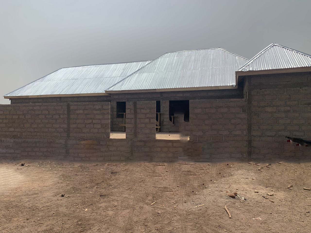 Construction of 1No. CHPS Compound and supply of 3No. tables, 12No. Chairs and 1No. delivery bed